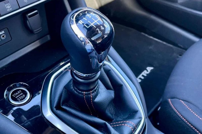 The gear shift in a manual transmission Nissan vehicle.