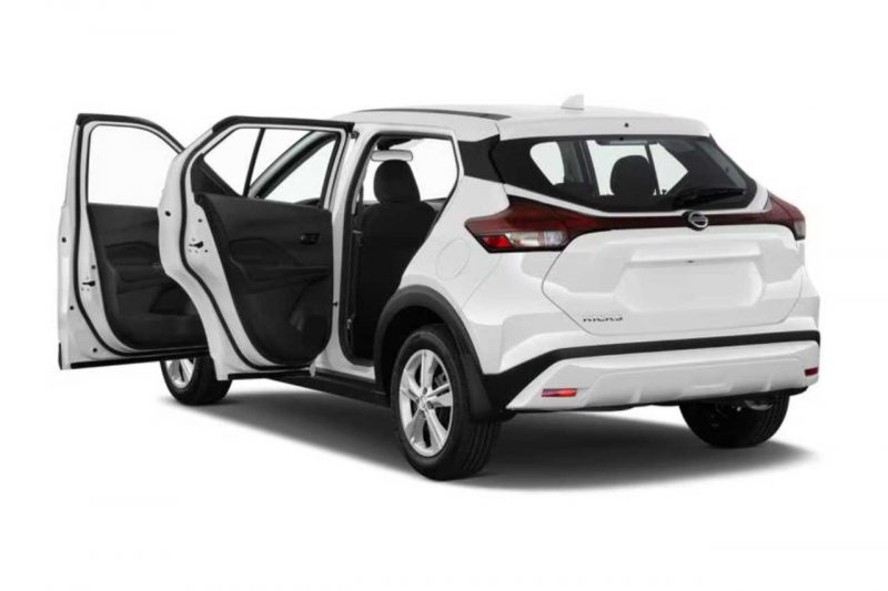 A 2024 Nissan Kicks in white, with its driver and passenger doors open.