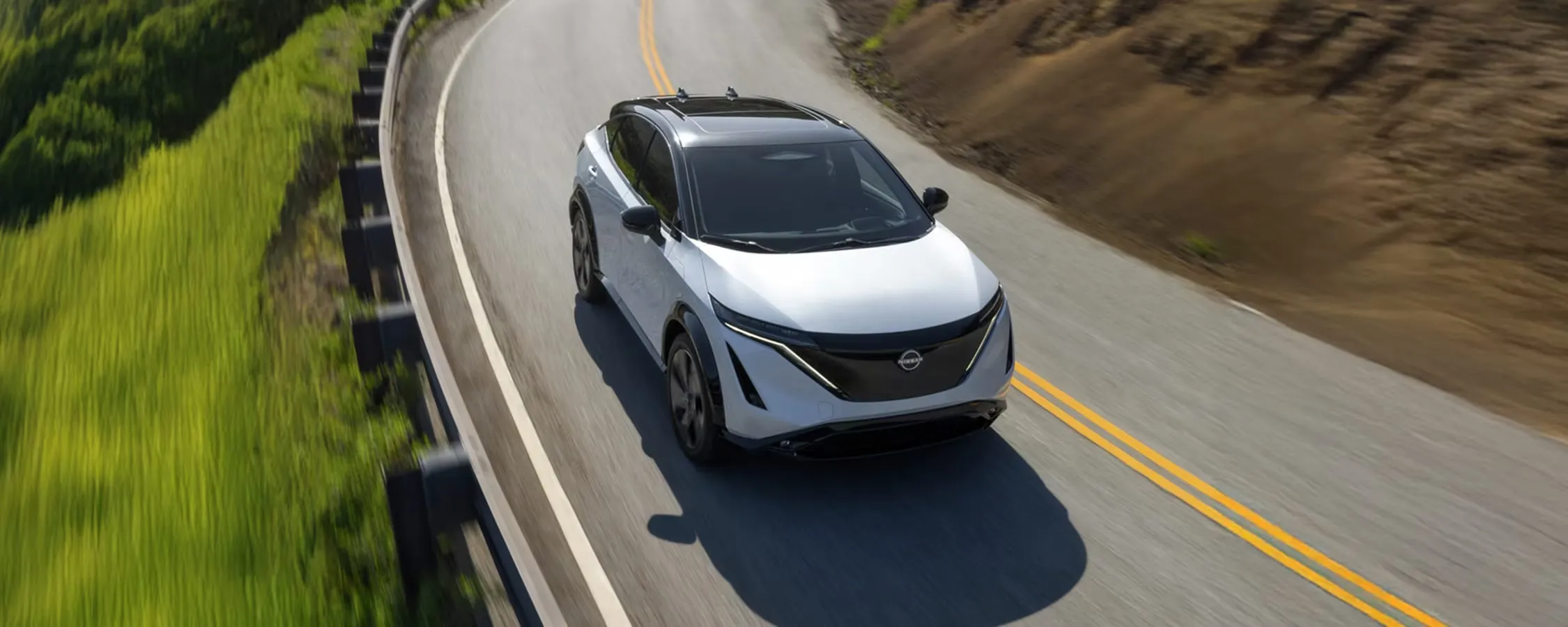 2026 Nissan Ariya seen from above on the road to present its dimensions and handling.