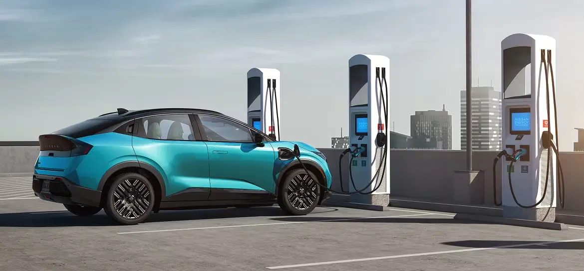 2026 Nissan Leaf plugged into fast charging stations.