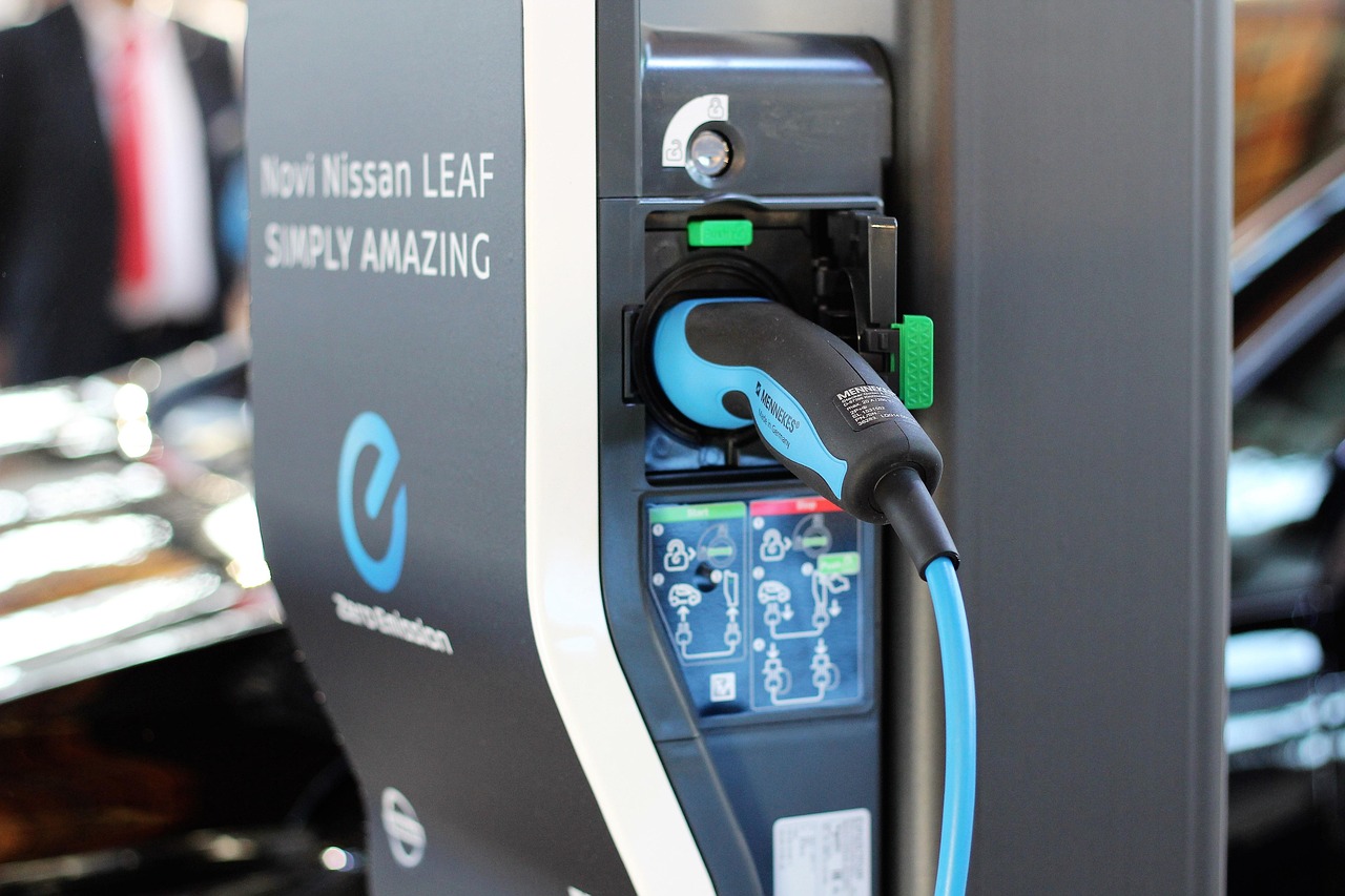 The image displays a charging port for the Nissan Leaf
